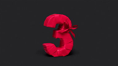 Still of the ifolor film showing the number tree packed in red wrapping paper with a red ribbon in front of a black background.